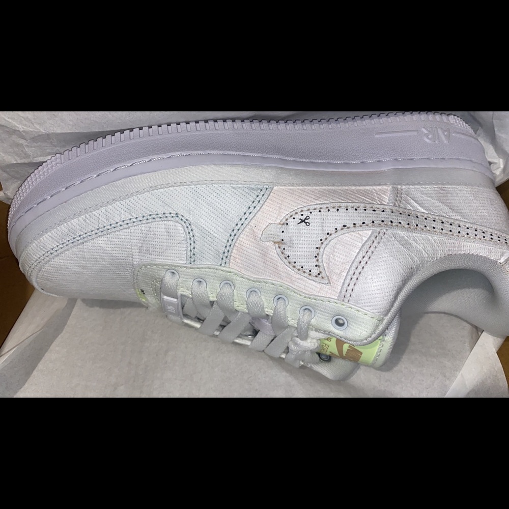 Womens Air Force 1’s in the color scheme artic punch/sesame